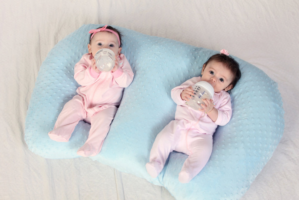 Twin Z Pillow Blue, removable cover close-up, simplifies cleaning for busy parents.