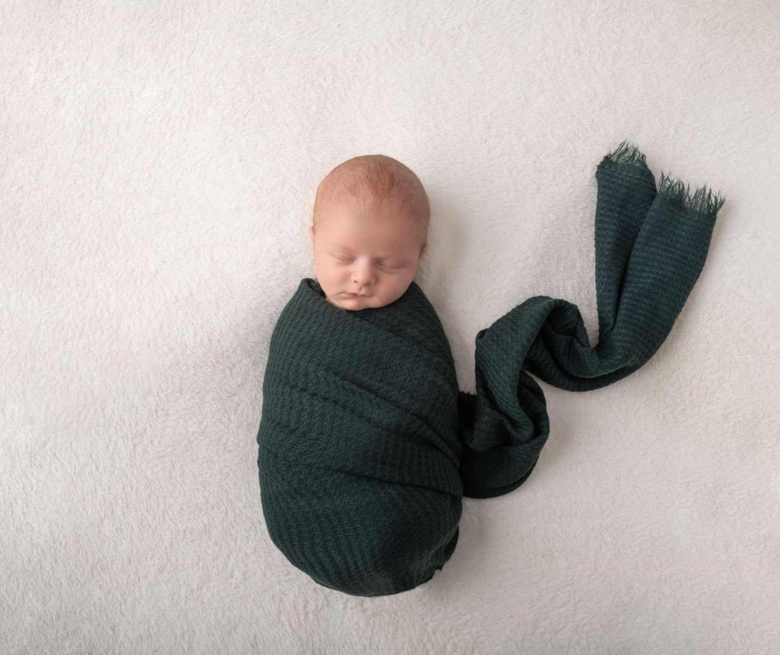 Twinkle Nest dark green wrap close-up highlighting soft waffle knit texture