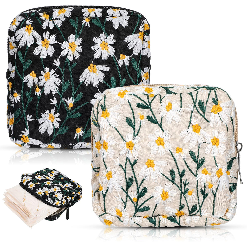 Tyqour daisy embroidery period bag keeps pads discreetly organized.
