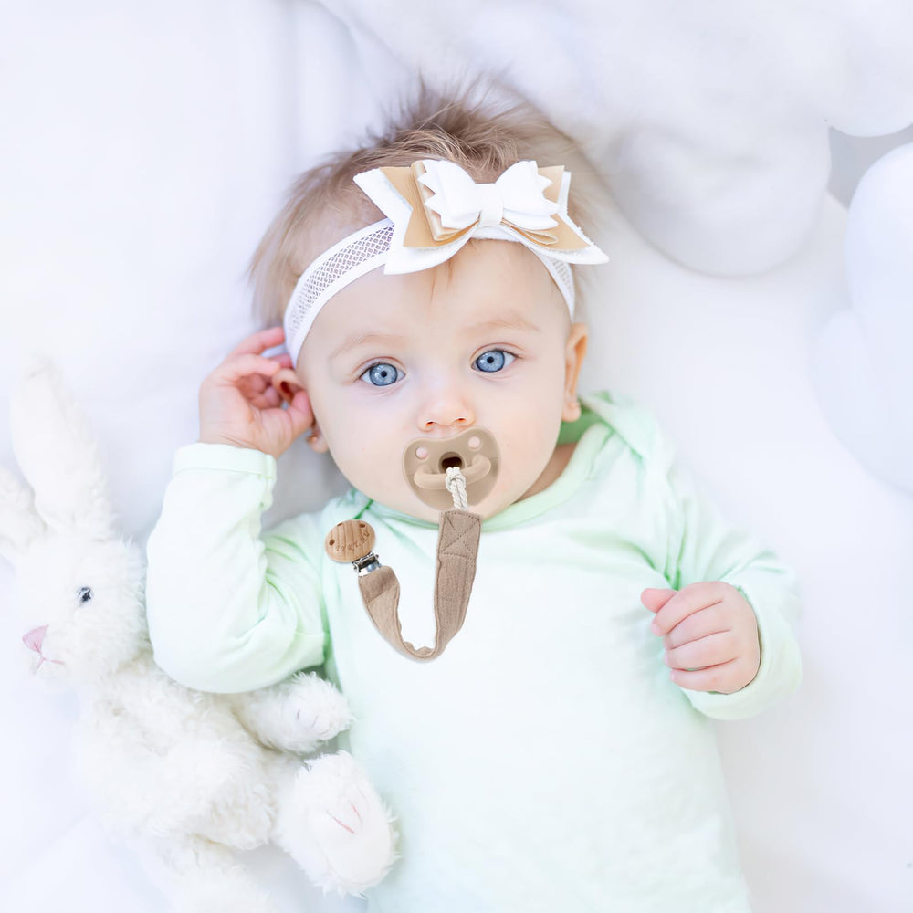 TYRY.HU newborn essentials gift-pack packaging in neutral tones.