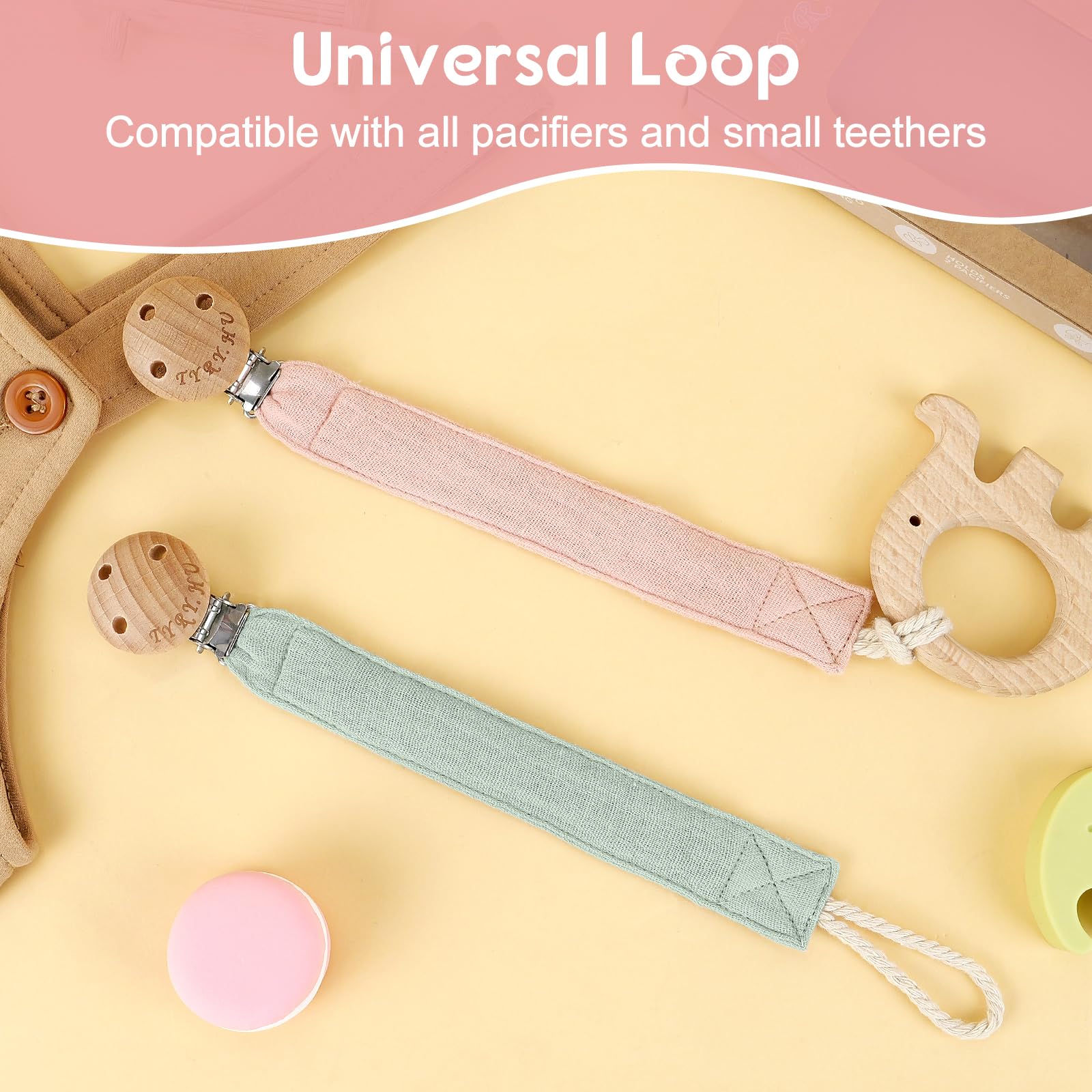 TYRY.HU Ribbon Pacifier Clip In Use: attaches to clothing, keeps pacifier close.