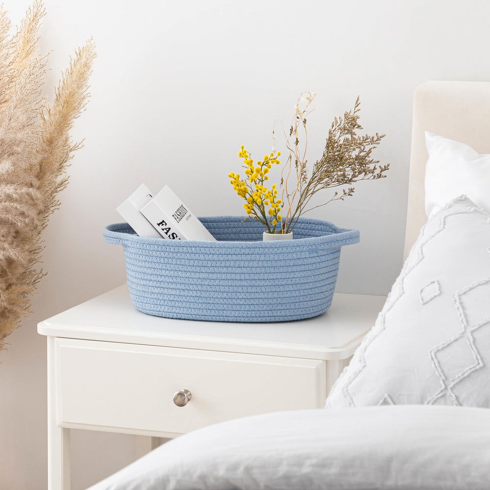 UBBCARE blue basket used as a cozy pet space with storage function.