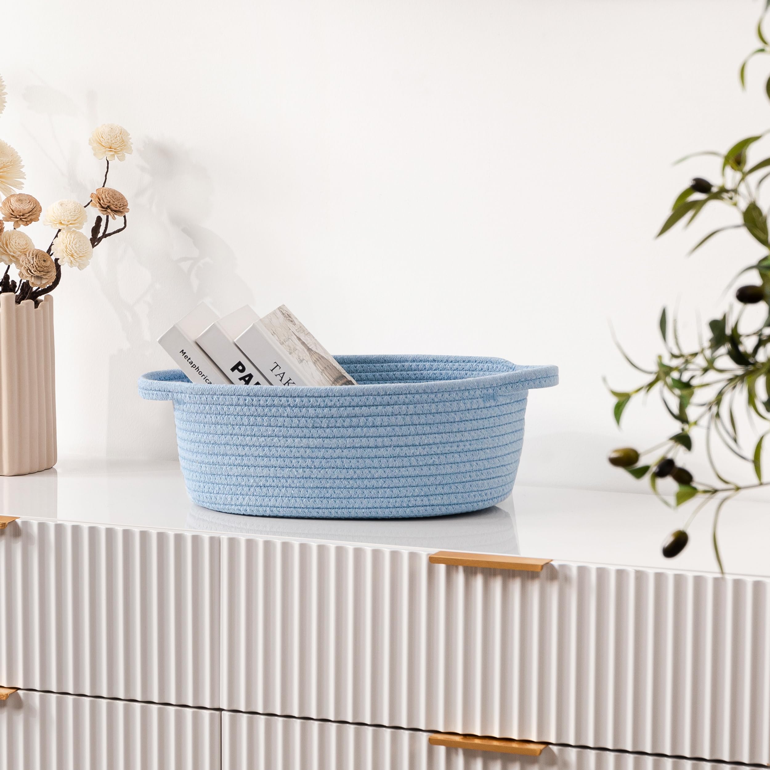 UBBCARE nursery blue storage basket on a shelf for organization.