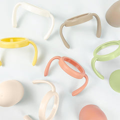 UBMOM rotary handles in pink enhance grip and cup handling for toddlers