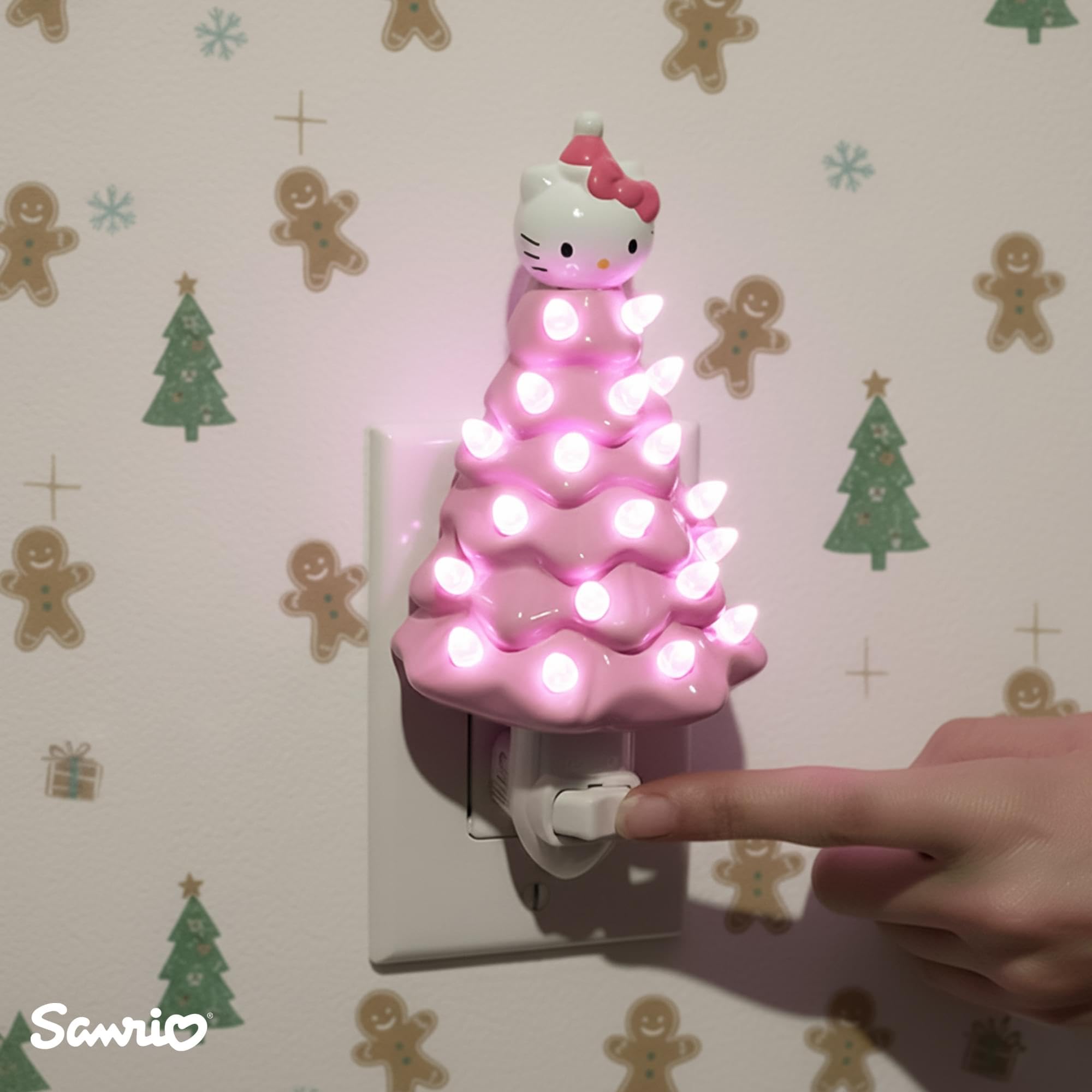 Ukonic Sanrio Hello Kitty pink nightlight lit with a warm glow