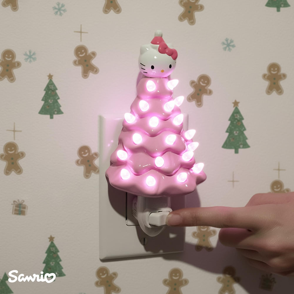 Ukonic Sanrio Hello Kitty pink nightlight lit with a warm glow