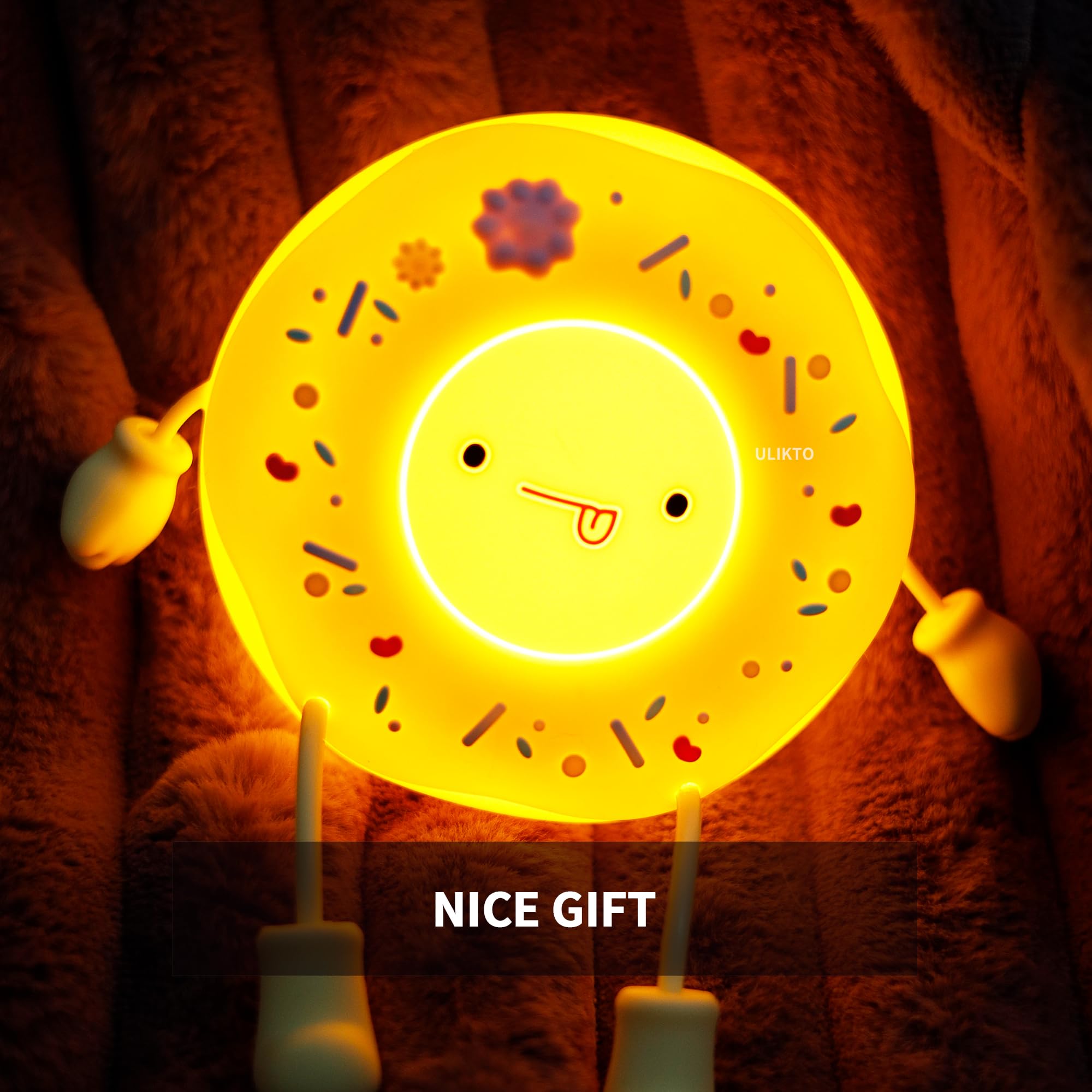ULIKTO Cute Donut Lamp on table providing soft night light for kids.