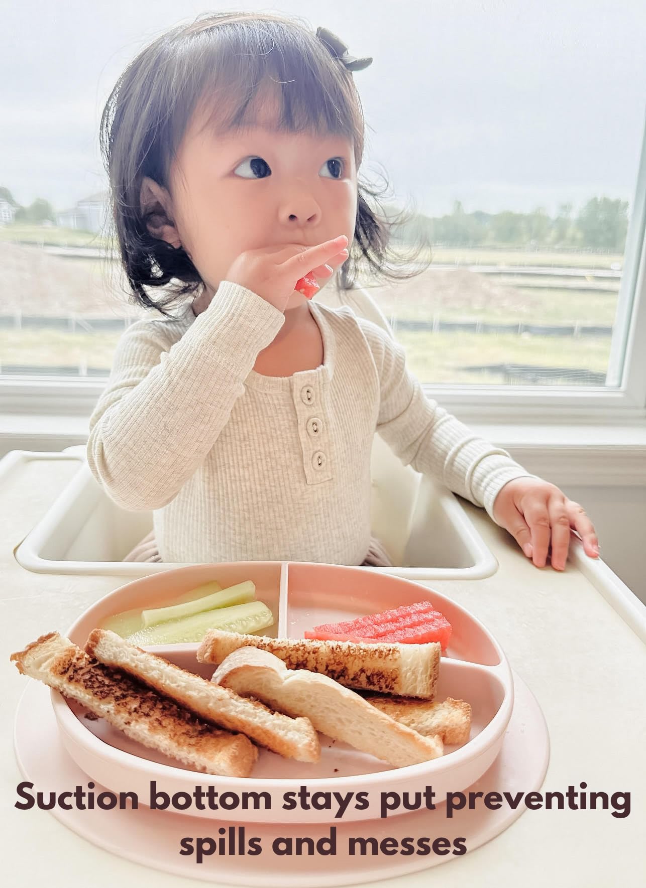Ullabelle pink spoon included to support self-feeding.