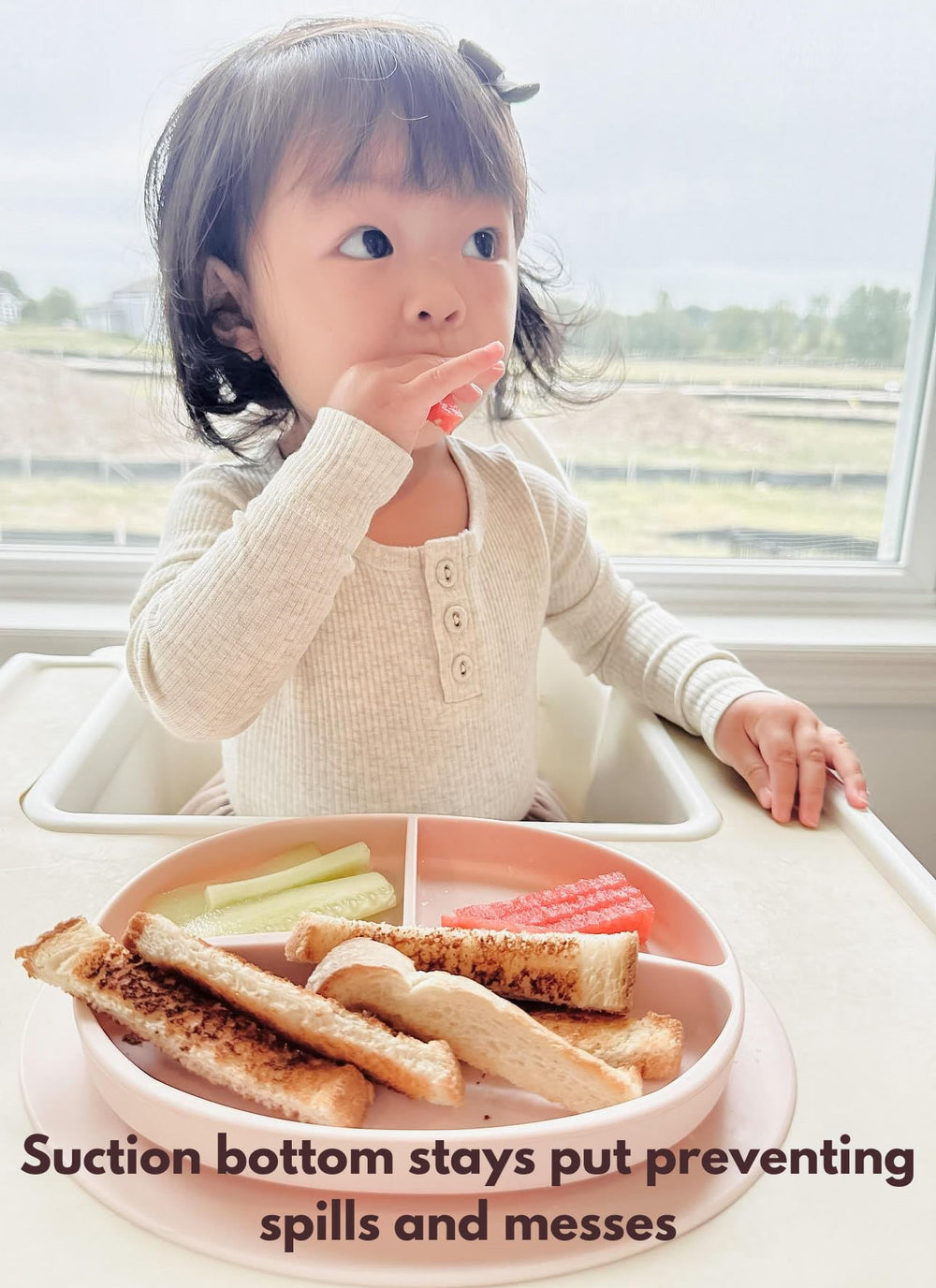 Ullabelle pink spoon included to support self-feeding.