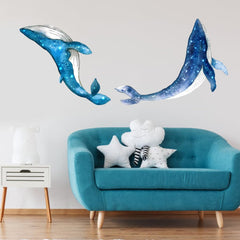 Under The Sea Whales vinyl art with whales gliding across a bathroom wall.