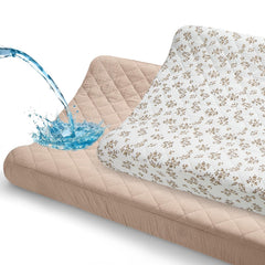 Unicorn Castle changing pad cover with muslin top layer, soft and absorbent for gentle diaper changes.