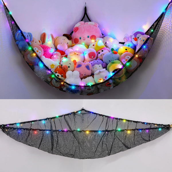 Unicorn Castle hammock with stuffed animals in a kid's room for tidy storage.