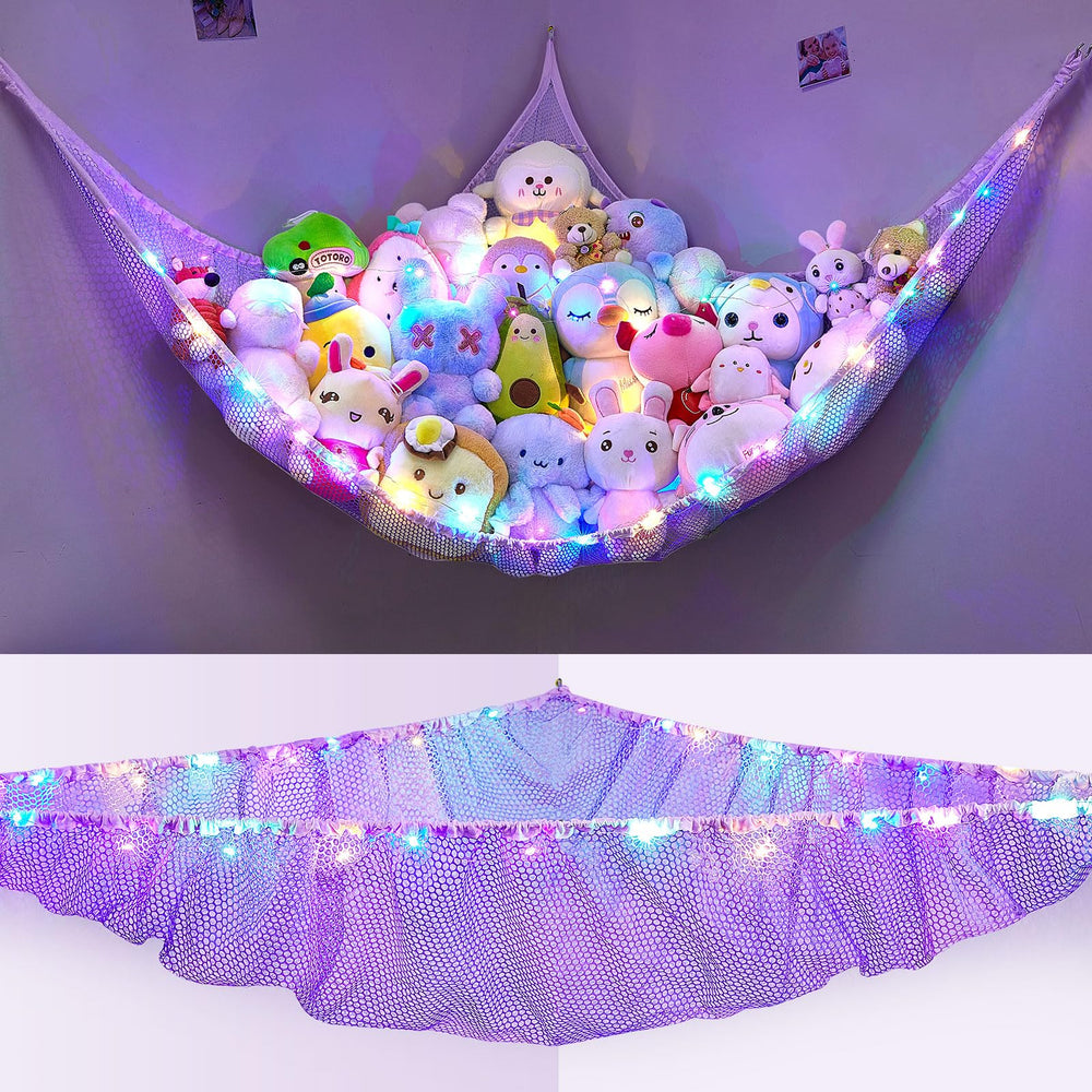 Unicorn Castle LED-lit hammock holds plush toys and adds cozy glow.