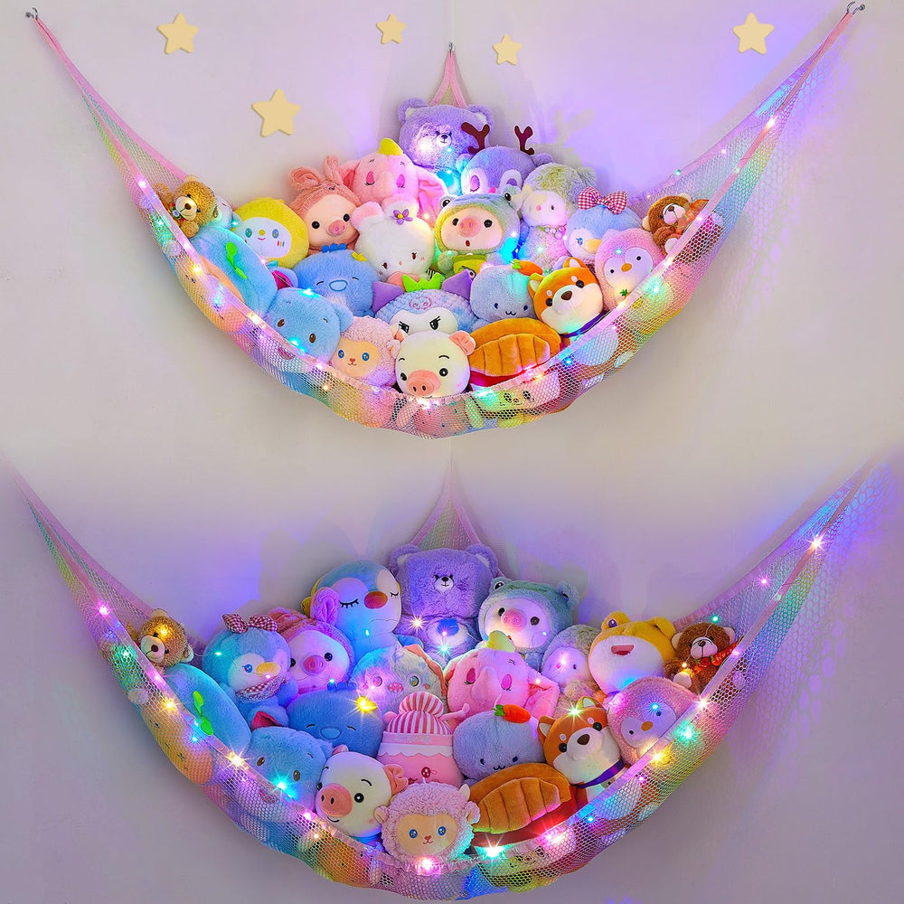 Unicorn Castle stuffed animals net with LED light hanging in a bright kids' room