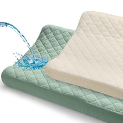 Unicorn Castle changing pad cover with a muslin top layer for gentle skin contact.