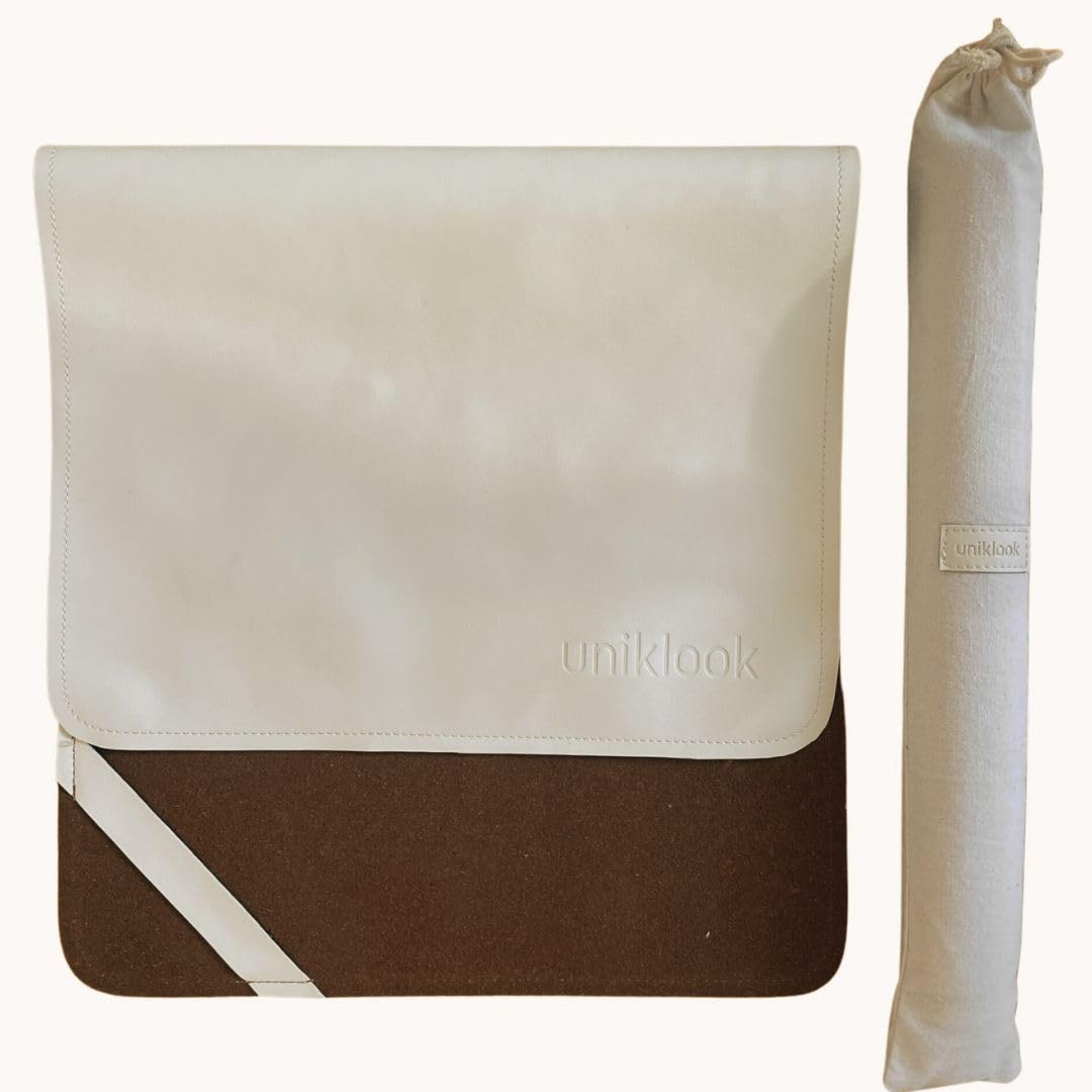 Uniklook leather portable changing pad for baby, compact on-the-go surface for quick diaper changes.