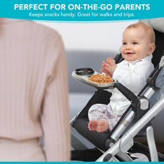 UNIQUIFY snack tray attached to bumper bar for secure stroller fit