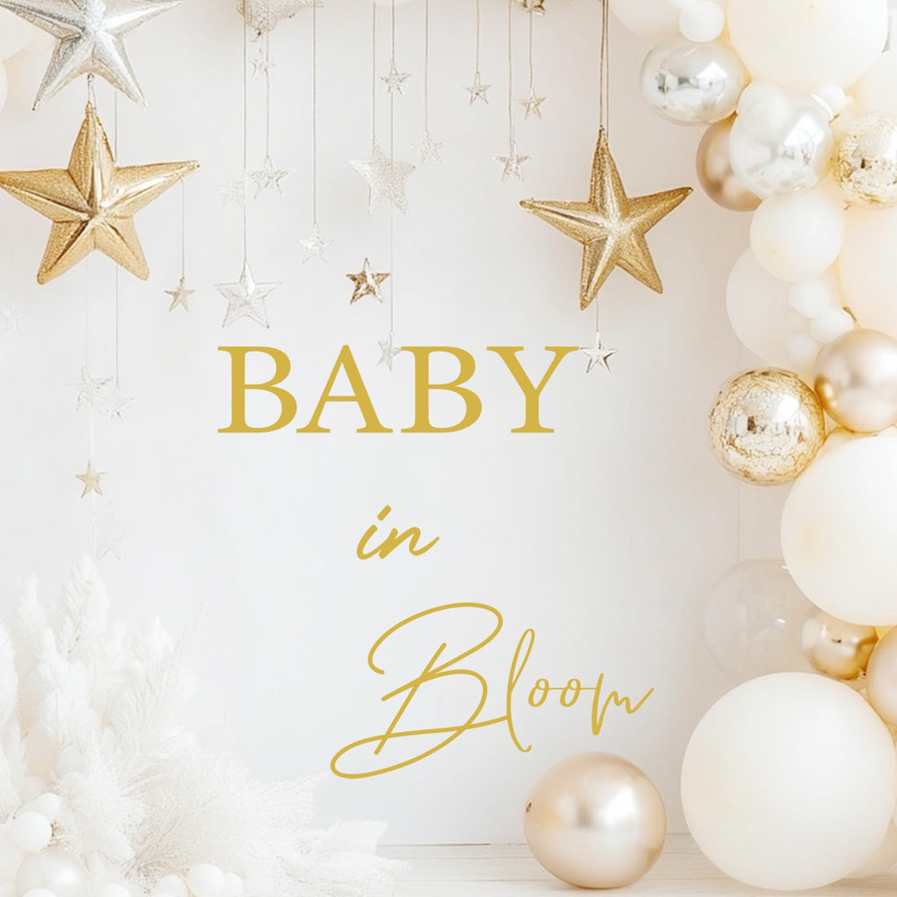 Unonede Baby in Bloom romantic letters in gold as a dreamy focal point