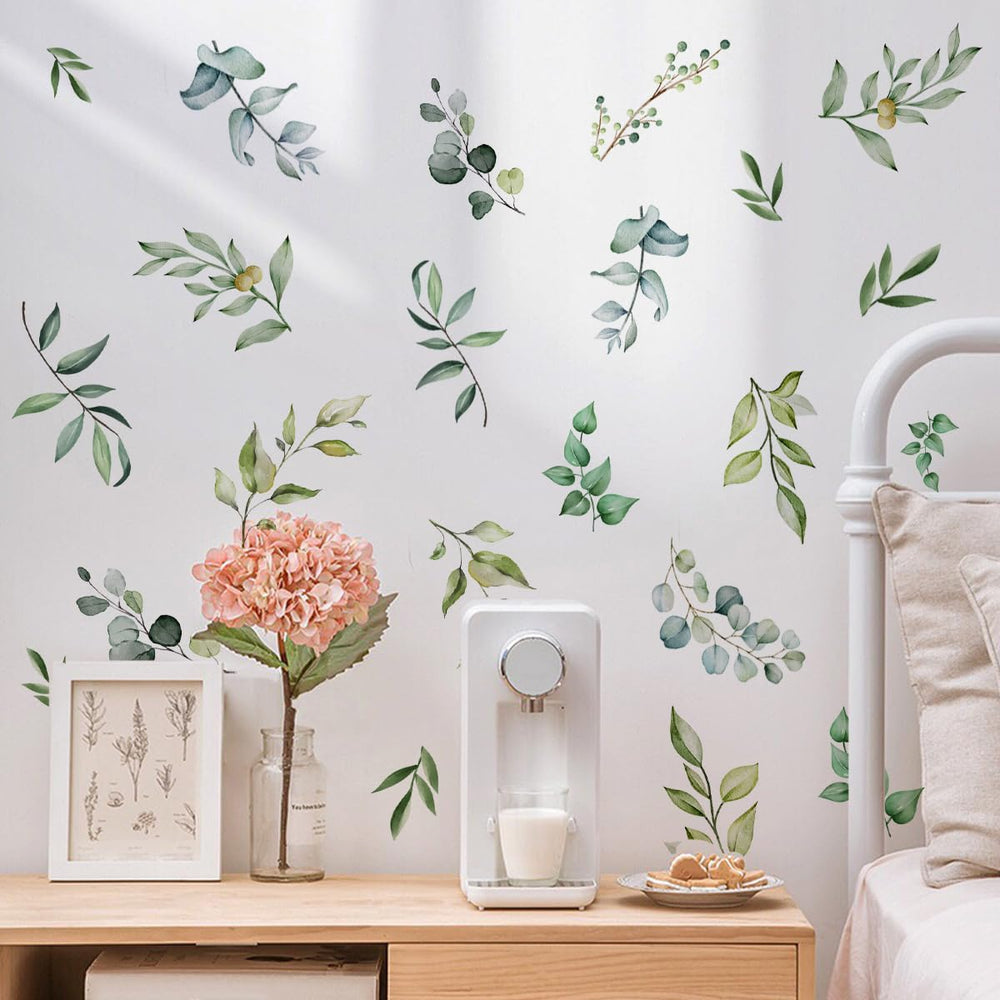 Unonede baby room green leaf sticker brightens nursery with a playful nature touch.