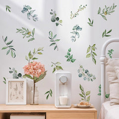 Unonede baby room green leaf sticker brightens nursery with a playful nature touch.
