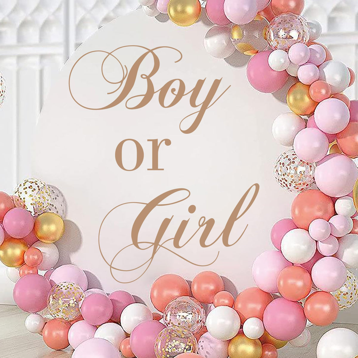 Unonede boy or girl sign decal on balloon arch backdrop for gender reveal