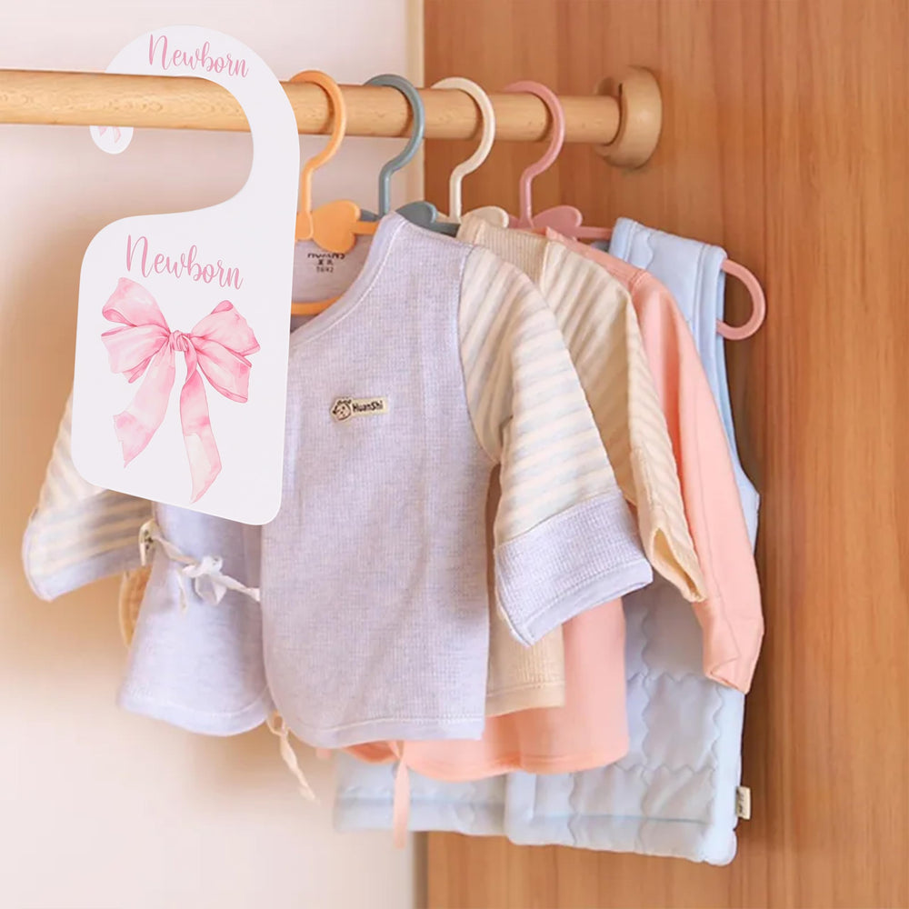 UOAOU bow-nursery-closet-divider-pink makes a thoughtful baby shower gift.