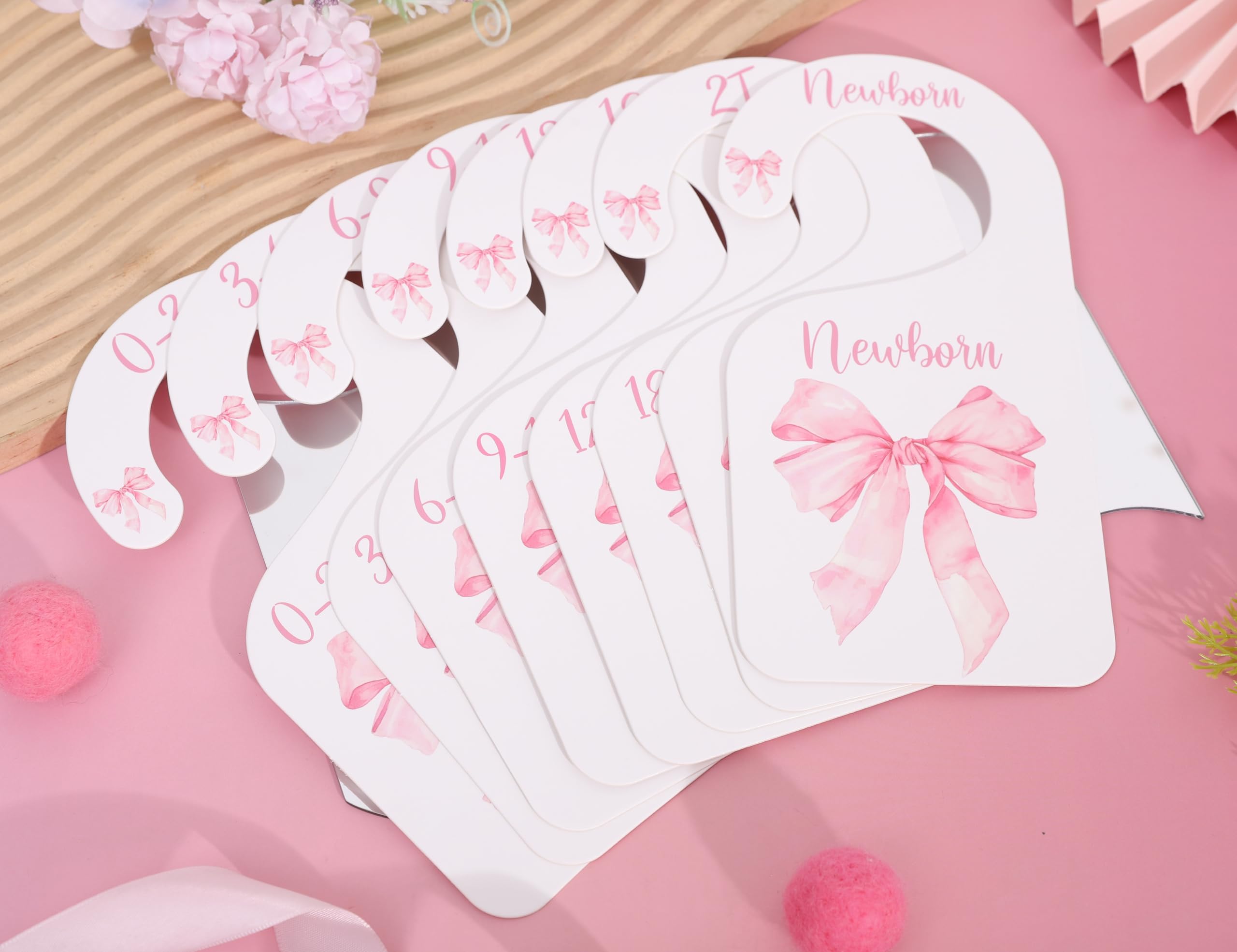 UOAOU bow-nursery-closet-divider-pink grows with baby from newborn to 24 months.