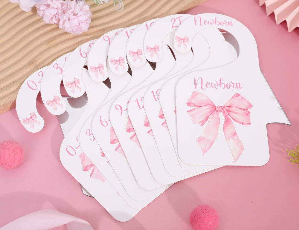 UOAOU bow-nursery-closet-divider-pink grows with baby from newborn to 24 months.