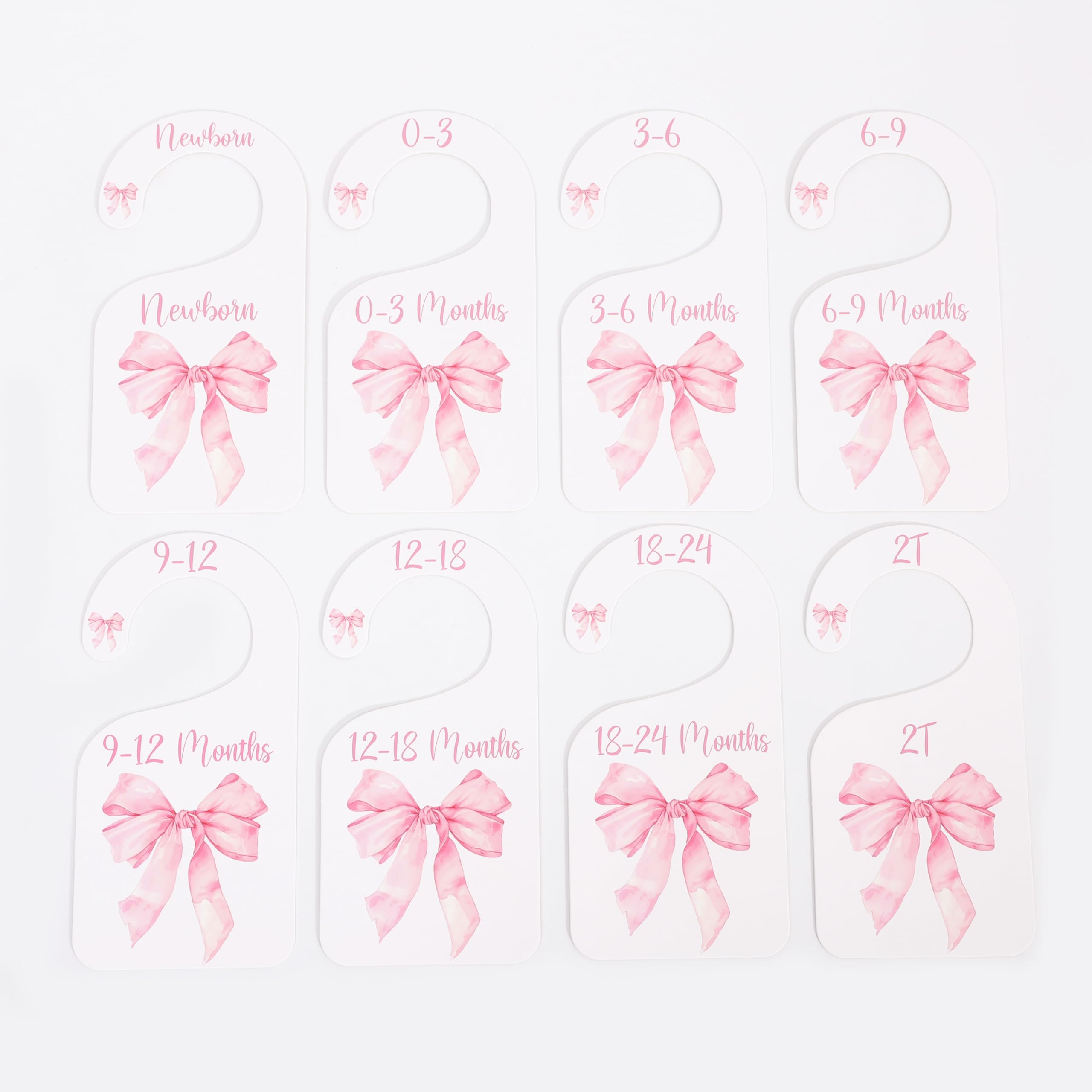 UOAOU bow-nursery-closet-divider-pink adds soft color to nursery décor and organization.