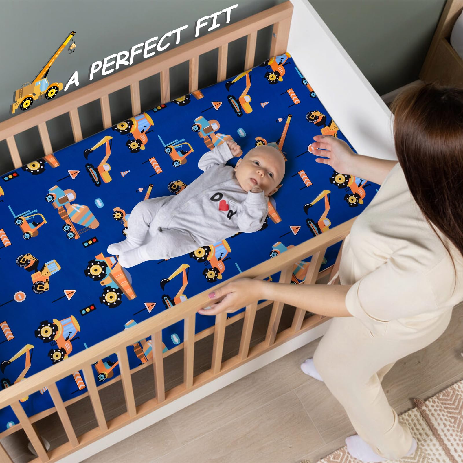 UOMNY engineering vehicle blue crib sheet offers a secure 360 wrap