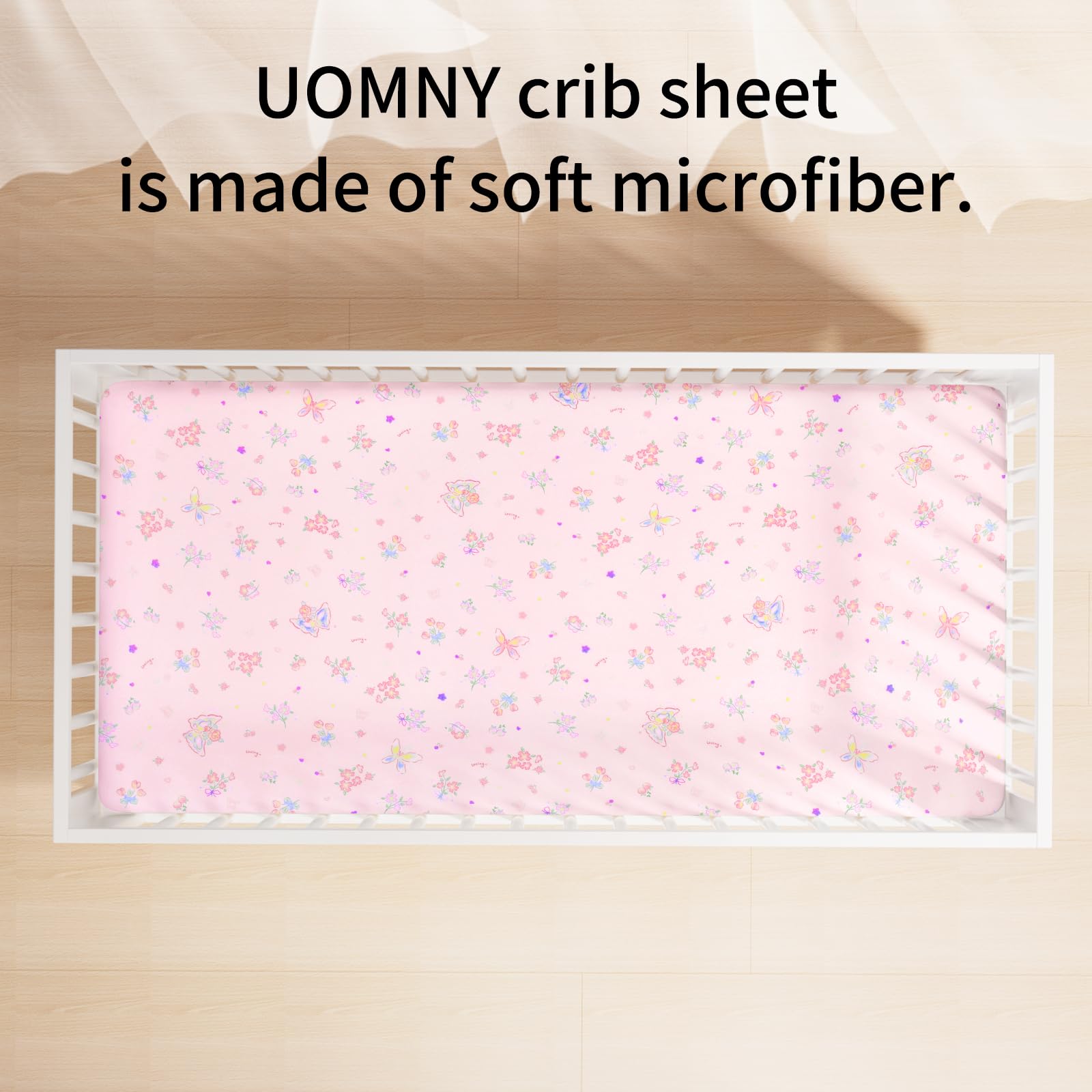 UOMNY Butterfly Flower Crib Sheet on crib mattress shows secure wrap