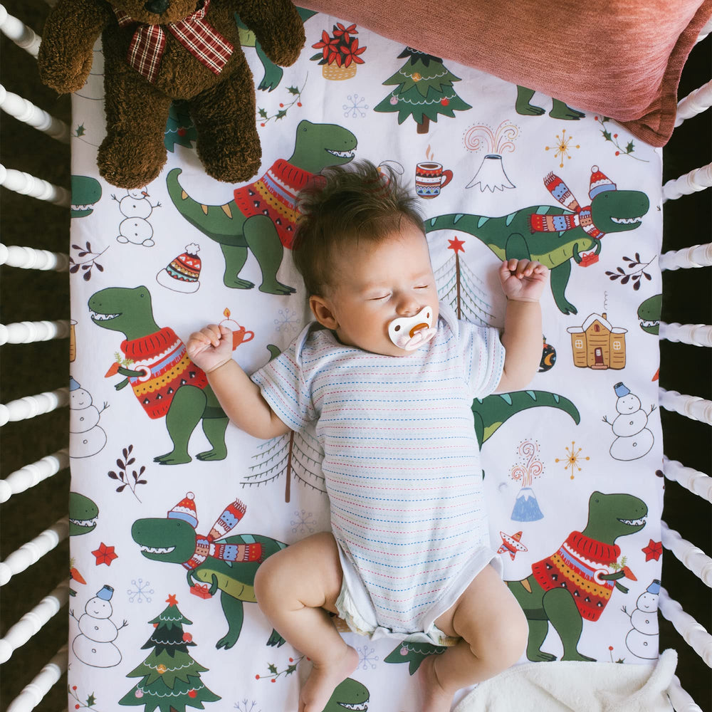 UOMNY Christmas dinosaur crib sheet fitted provides playful, cozy bedding for toddlers.