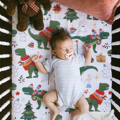 UOMNY Christmas dinosaur crib sheet fitted provides playful, cozy bedding for toddlers.