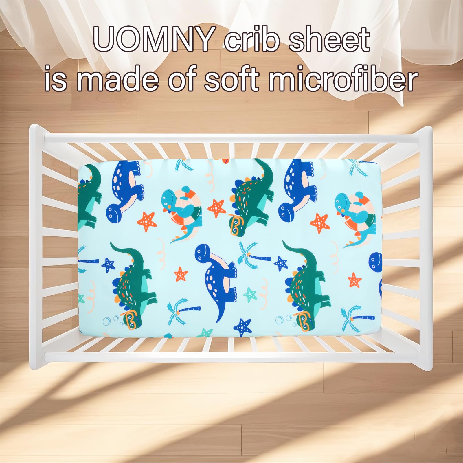 UOMNY fitted crib sheet with unisex design complements nursery decor