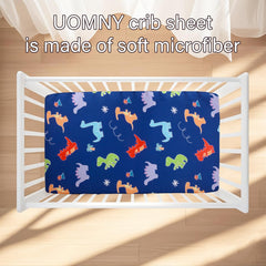 UOMNY fitted crib sheet showing easy on/off and staying in place.