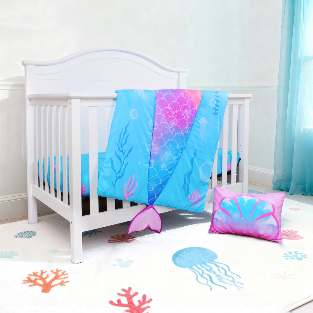 UOMNY Mermaid crib bedding set demonstrates a snug, well-fitted look on standard cribs.