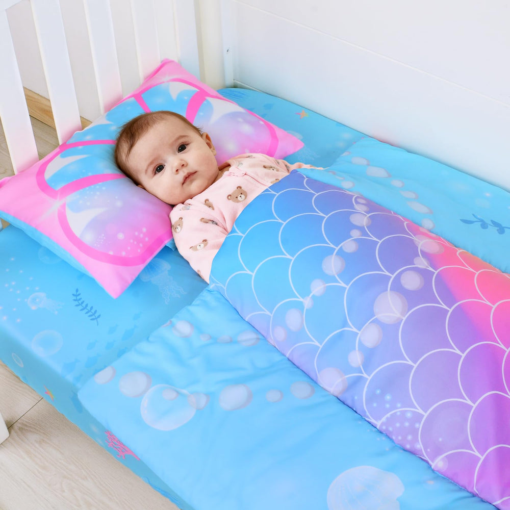 UOMNY Mermaid pillowcase adds soft finishing touch for a cozy nursery.