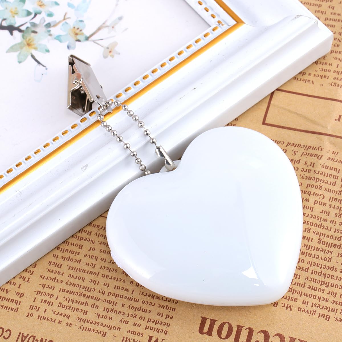 Uonlytech compact-size bag lamp fits discreetly inside a handbag.