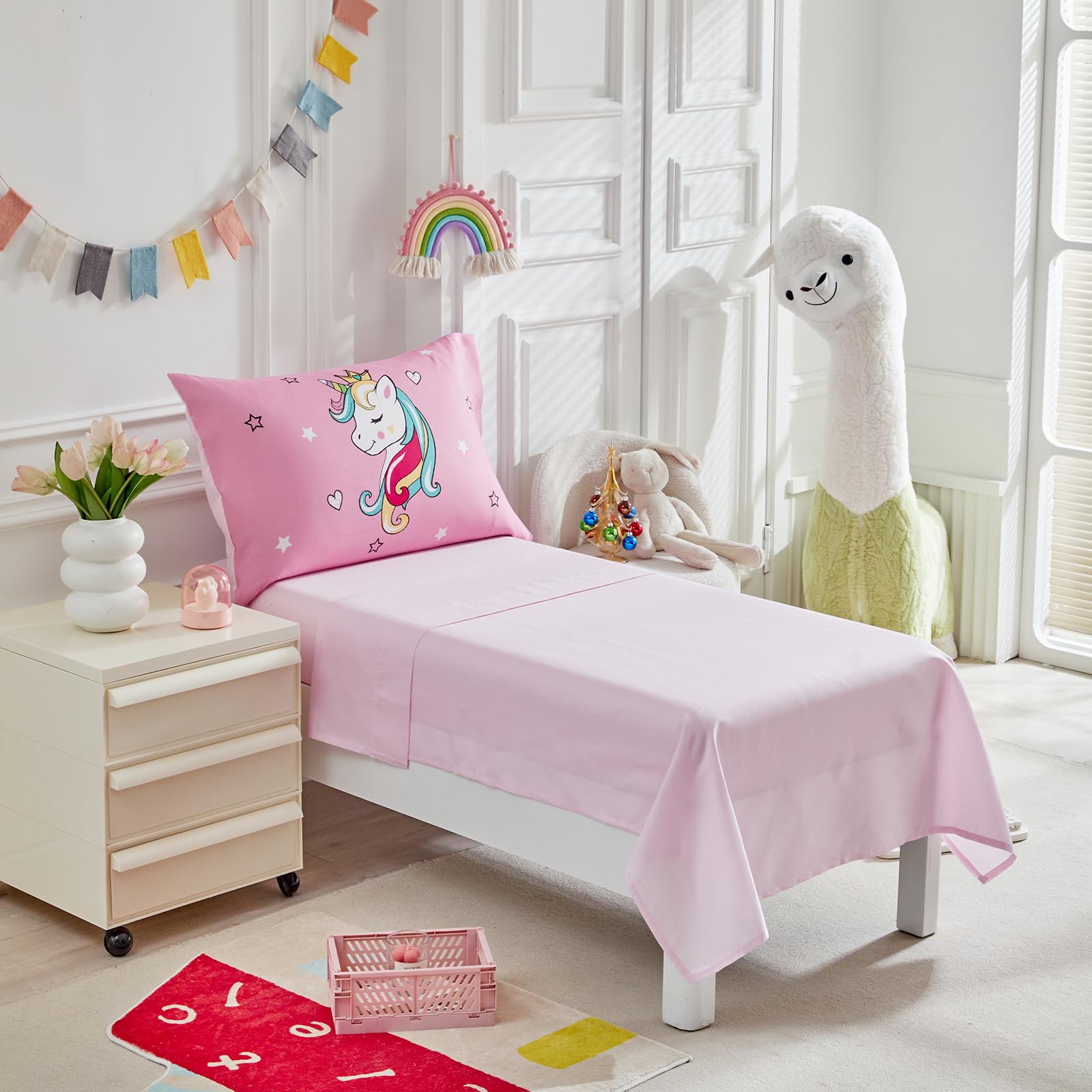 Whole bed setup on a toddler bed inspires cozy nights.