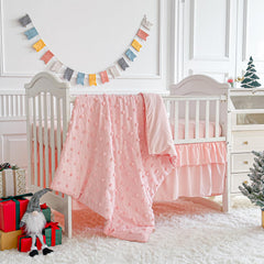 UOZZI Bedding comforter with pink pom poms adds cozy luxury