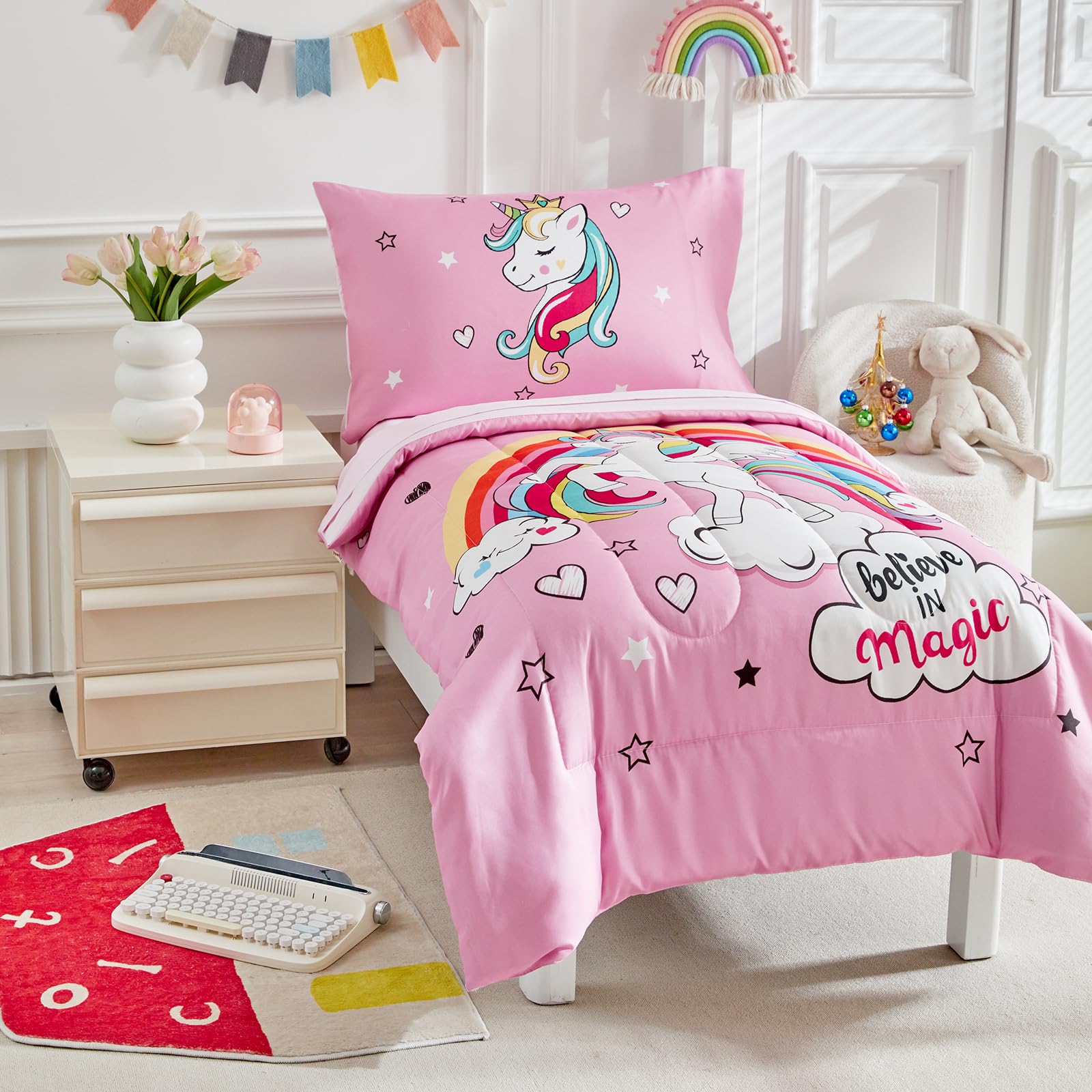 Reversible comforter shows clouds and stars for versatile styling.