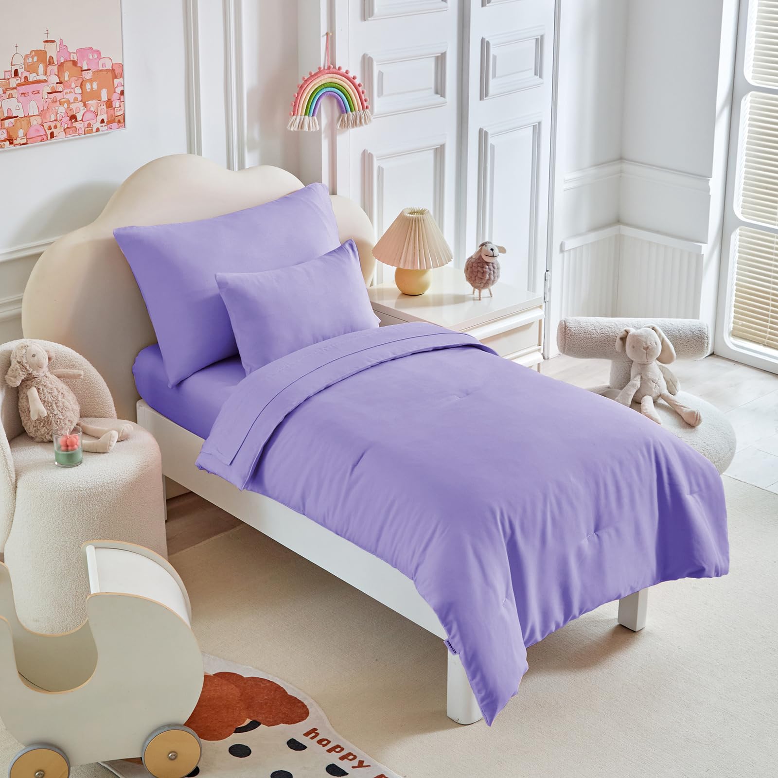 UOZZI Bedding toddler set reversible comforter offers cozy warmth for bedtime.