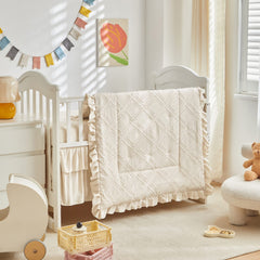 UOZZI BEDDING tufted ruffle crib comforter adds cozy charm to nursery.