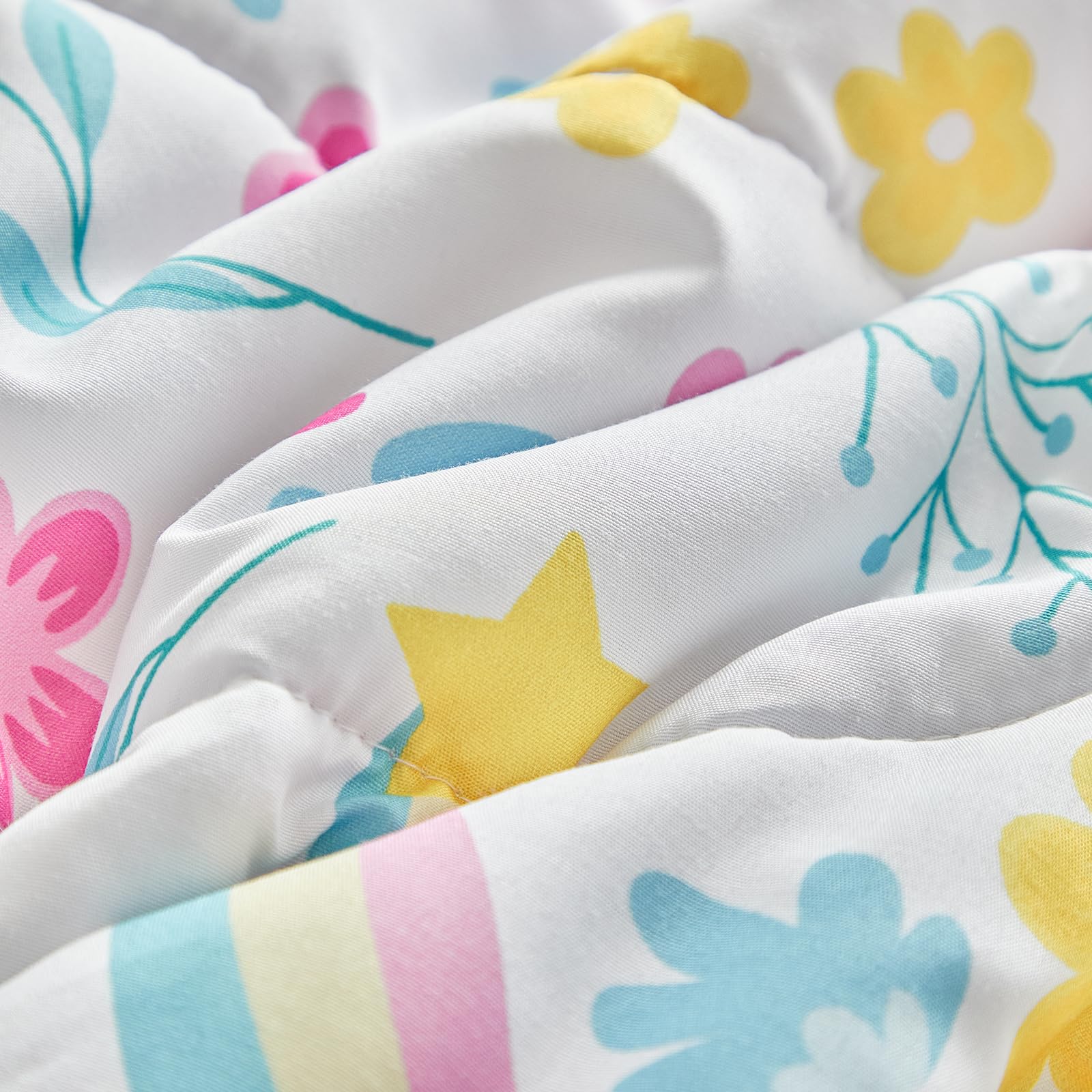 UOZZI BEDDING rainbow dots and pink accents for playful bedtime scenes.