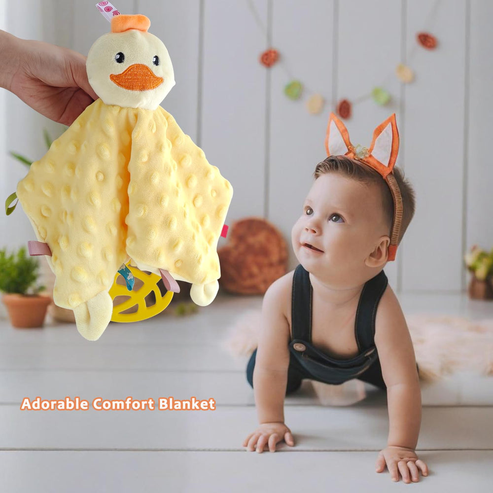 Upalupa blanket features a soft head bell for gentle auditory exploration.