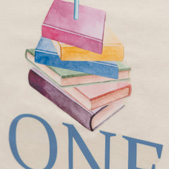 Upfirst blue book decal wall closeup for storybook decor.