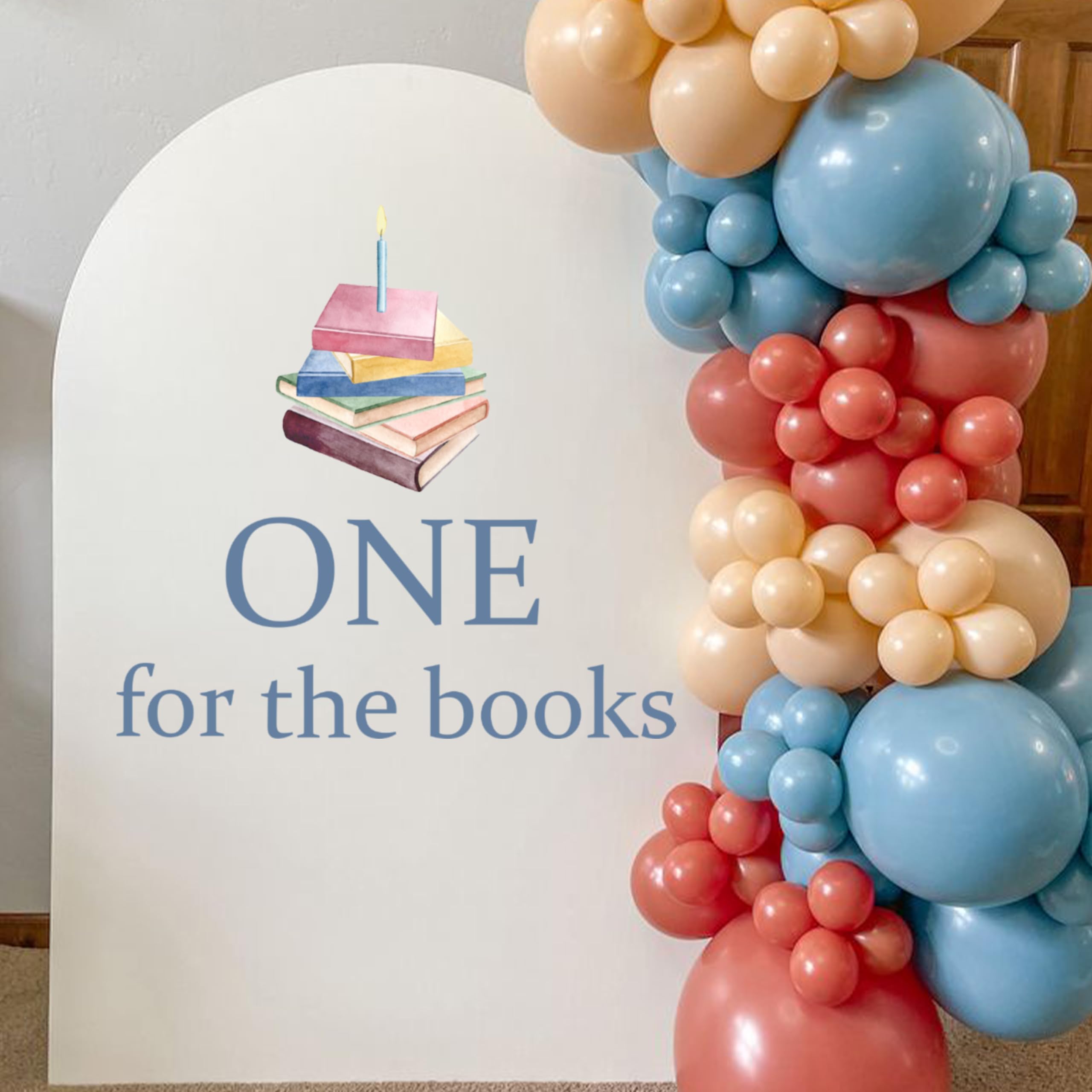 Upfirst One for Books blue arch backdrop decal enhances birthday party ambiance.
