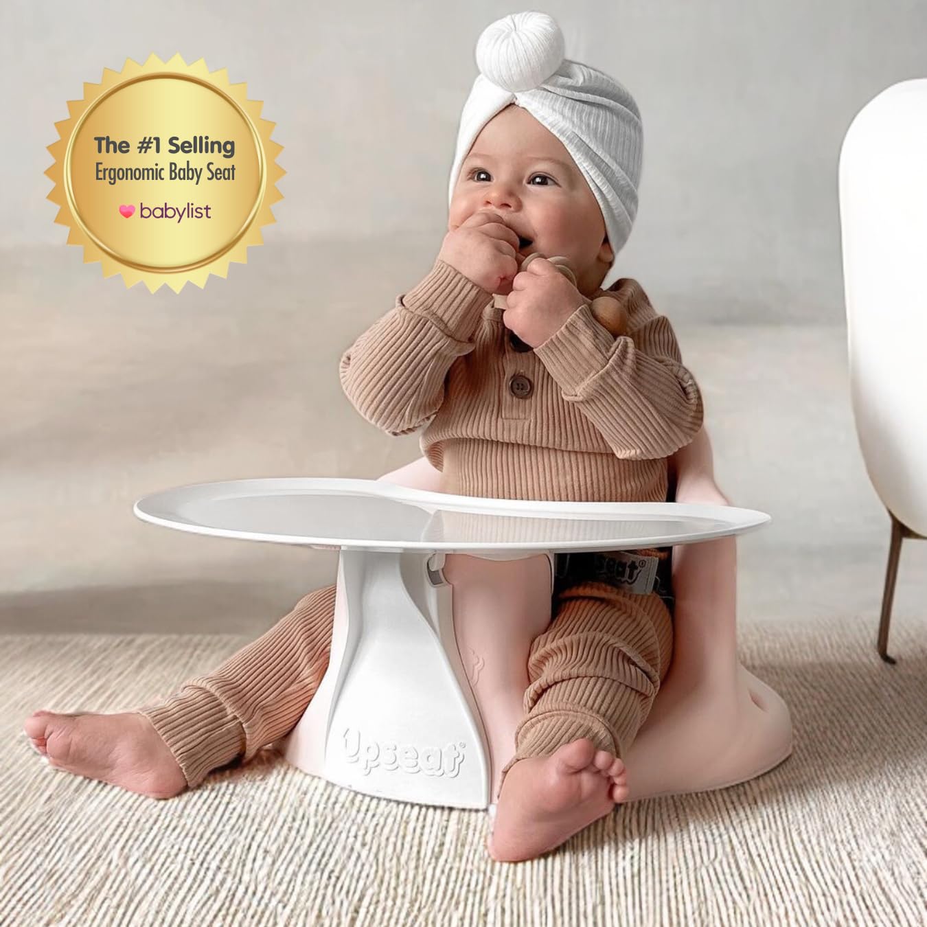 Upseat booster seat with tray converts to a high chair for meals.