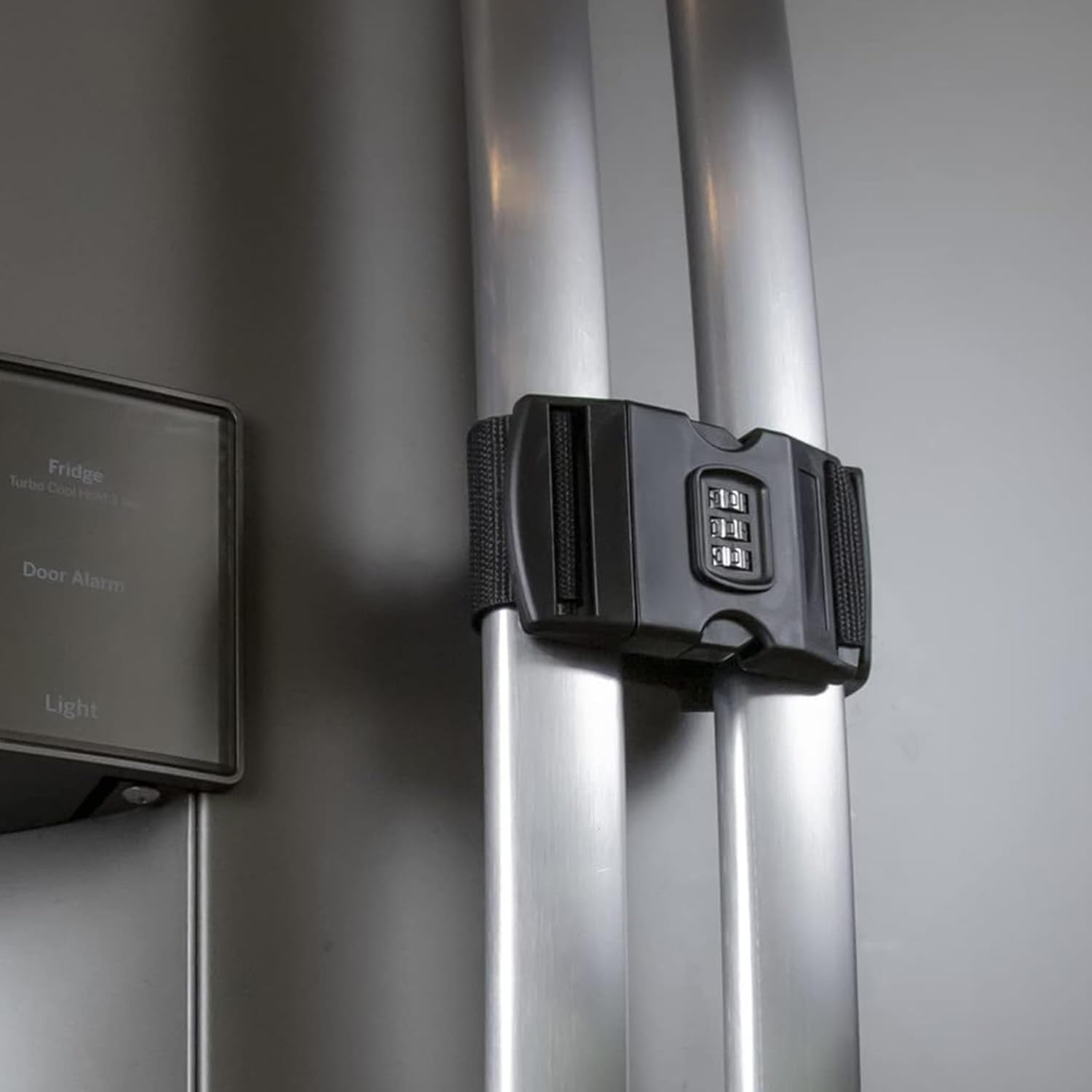 Urban August fridge lock closed on French doors demonstrating child safety