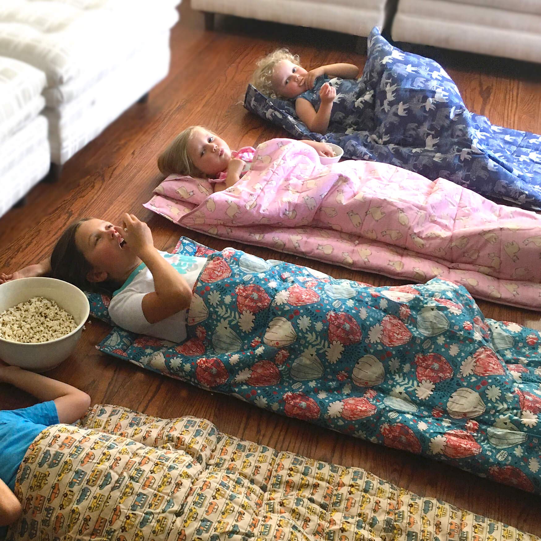 Urban Infant Bulkie nap mat features kid-friendly backpack straps and buckles.